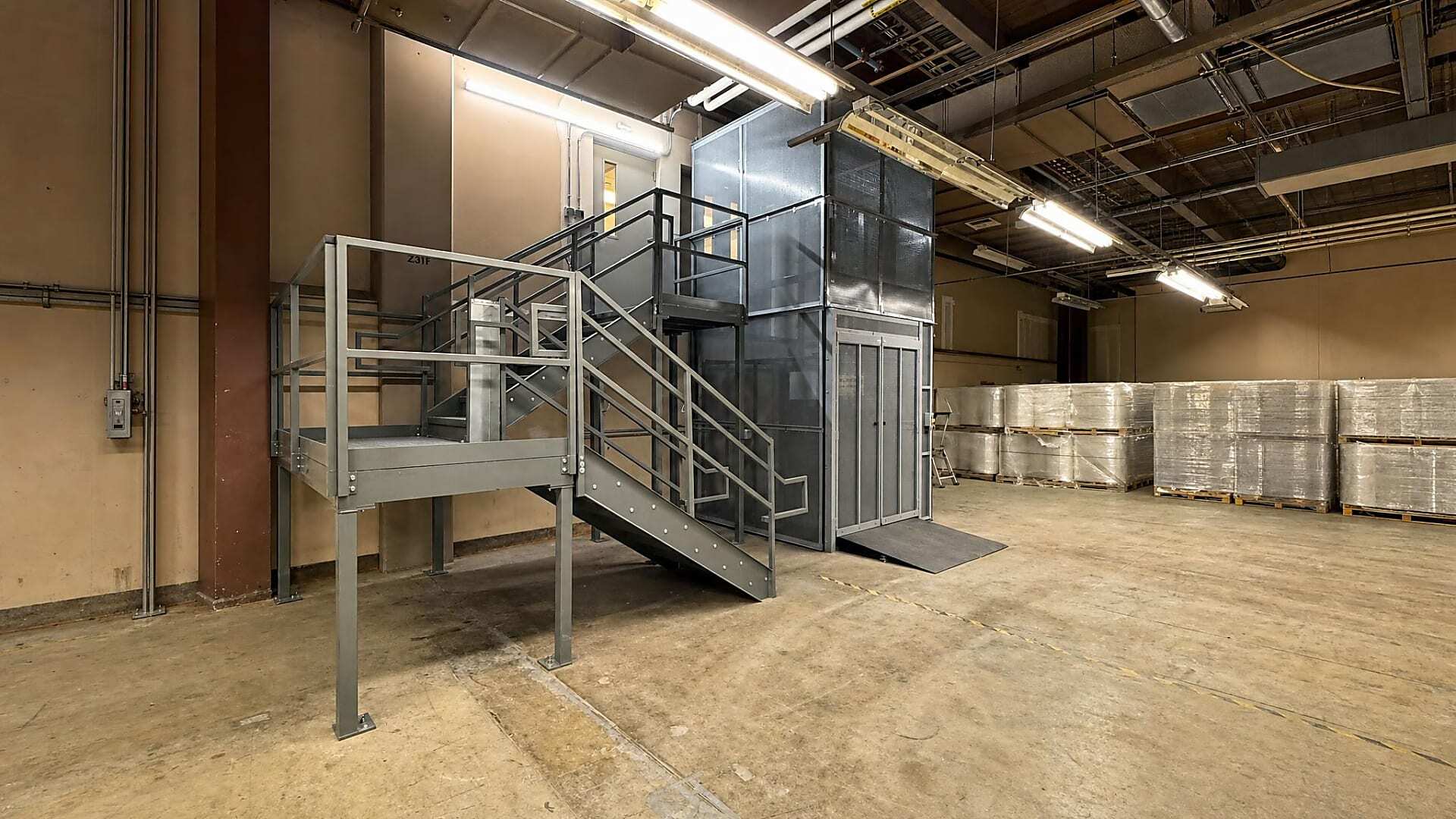Solution image showing the completed project for Manufacturing Facility Improves Lab Access with VRC and Stairs