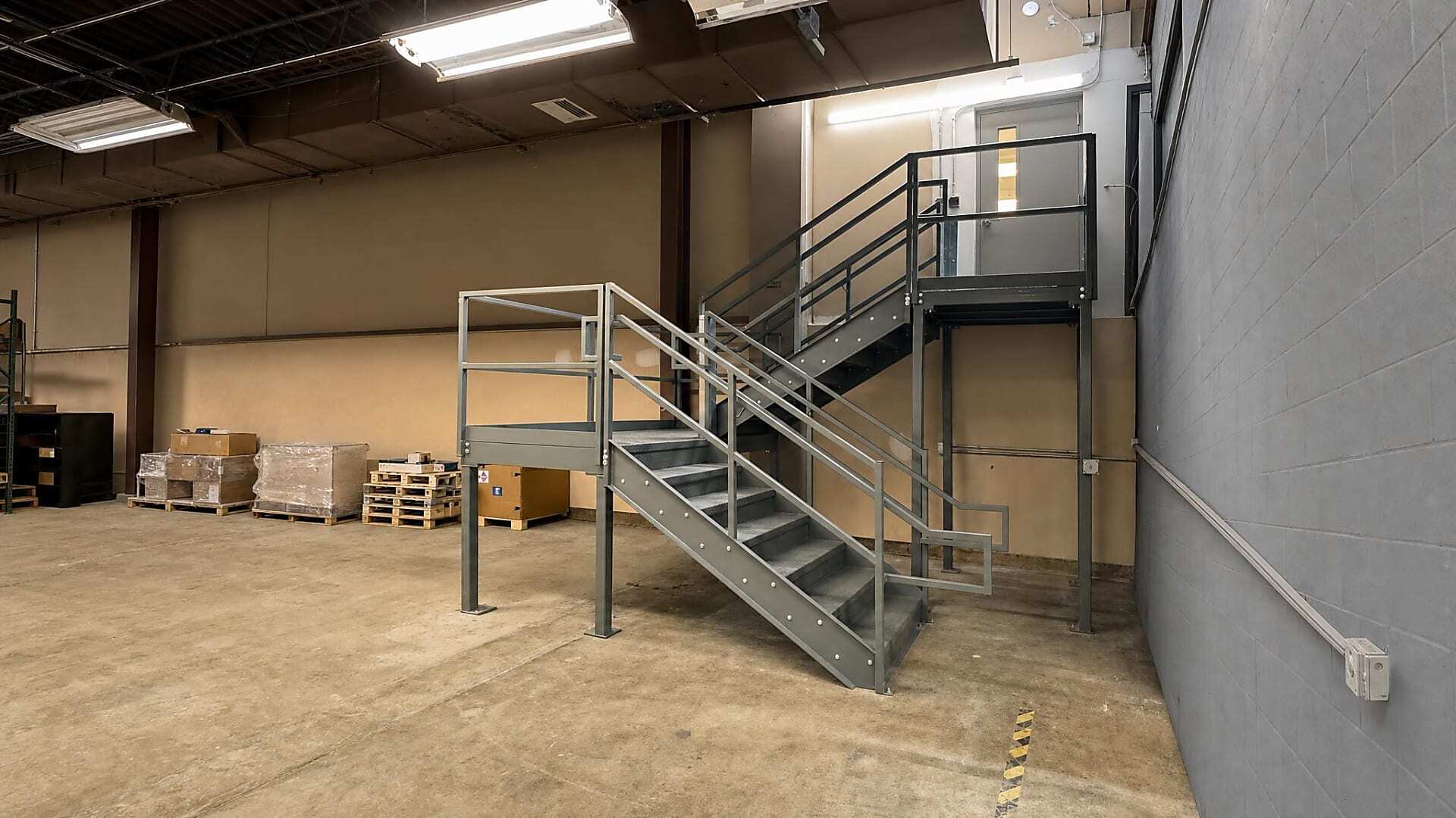 Manufacturing Facility Improves Lab Access with VRC and Stairs
