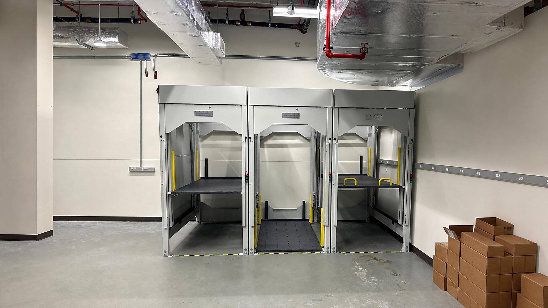 Hospital crib stackers and bed storage lifts at a North Texas medical facility