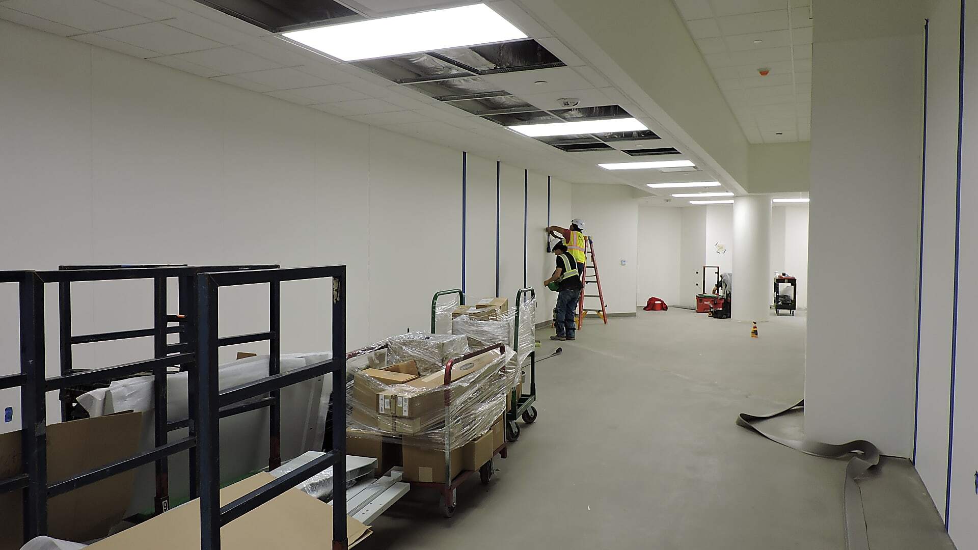 Hospital beds stored on the floor before vertical bed storage installation at Texas Health Presbyterian Hospital Plano