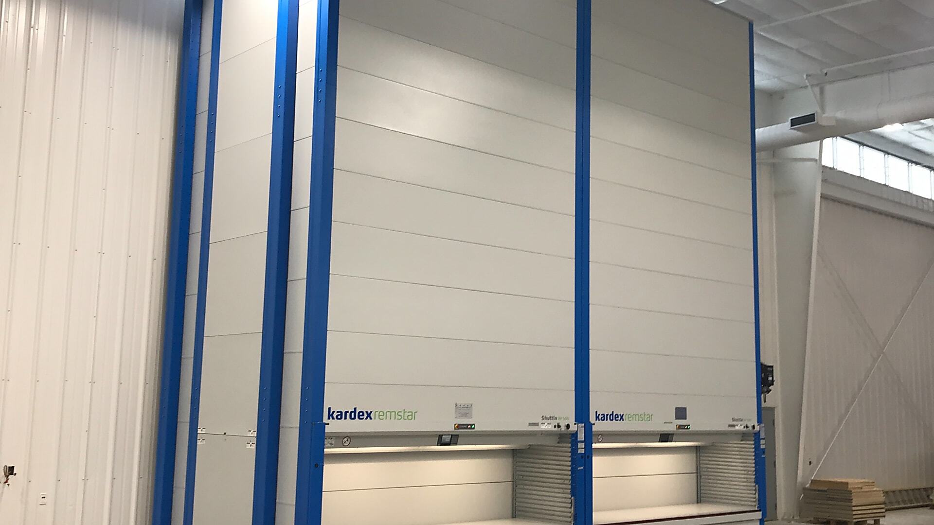 Kardex Remstar Vertical Lift Modules replacing warehouse mezzanine shelving for a business aircraft manufacturer