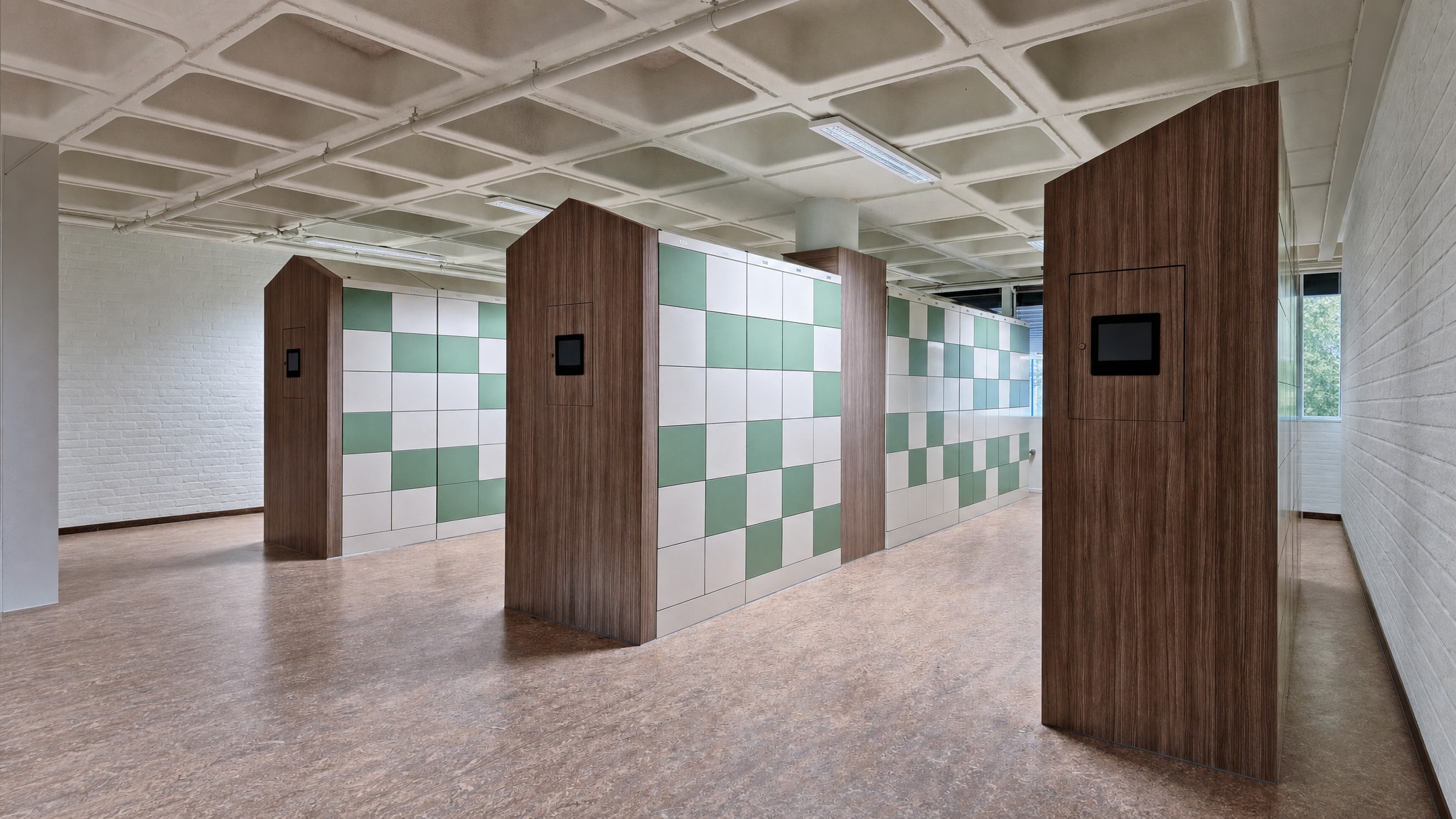 Students using smart lockers to pick up devices at a university