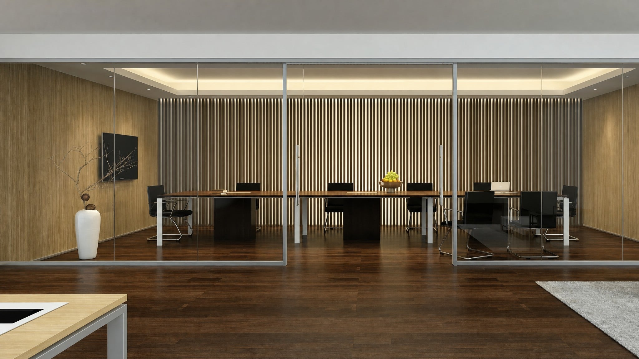 Frameless glass walls in a flexible office interior